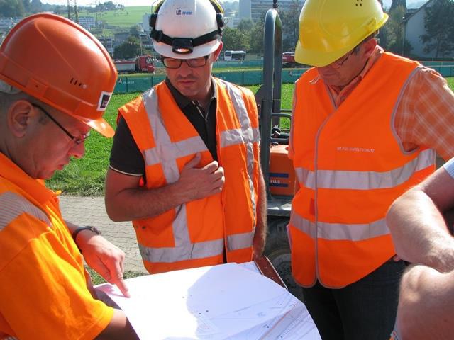 Besprechung auf Baustelle
