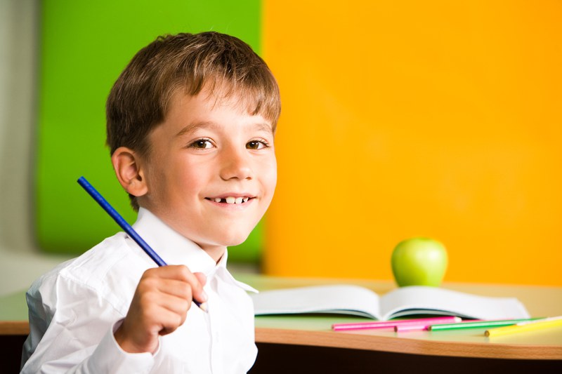 boy with pen in the hand